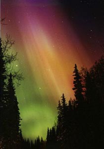 A green/orange/red/purple aurora