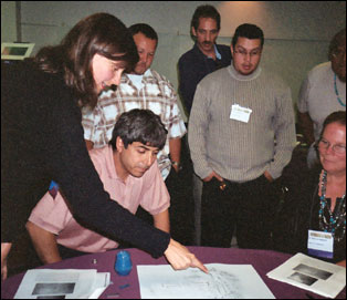 Laura Peticolas, of the THEMIS E/PO team, demonstrates an activity