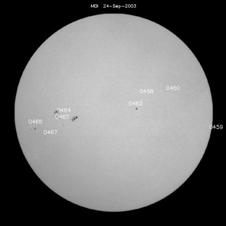 Example of a picture of the Sun with active regions labeled.
