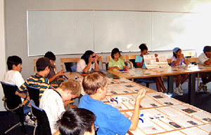A classroom of students sitting in an L shape
