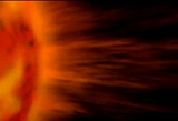 Black background with a section of a red glowing disk showing on the left fourth of the screen. There are wispy strands of lines emiting radially away from the disk.
